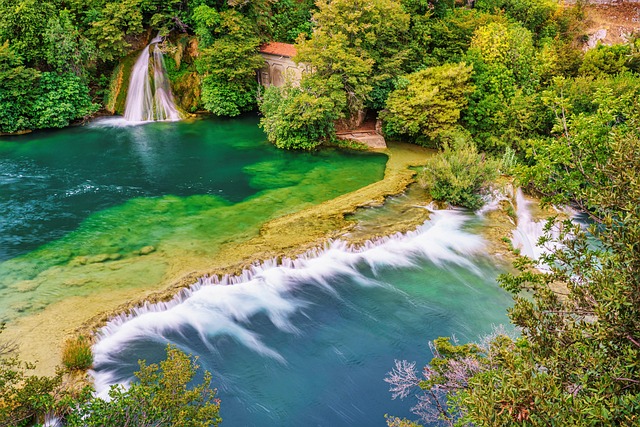Krka National Park aerial view with cascading waterfalls Skradinski buk and emerald pools — private day tour from Šibenik